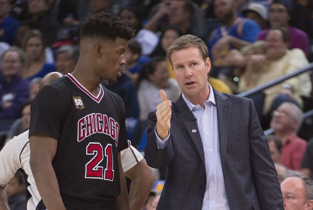 November 20, 2015; Oakland, CA, USA; Chicago Bulls head coach Fred Hoiberg (right) instructs guard Jimmy Butler (21) during the fourth quarter against the Golden State Warriors at Oracle Arena. The Warriors defeated the Bulls 106-94. Mandatory Credit: Kyle Terada-USA TODAY Sports