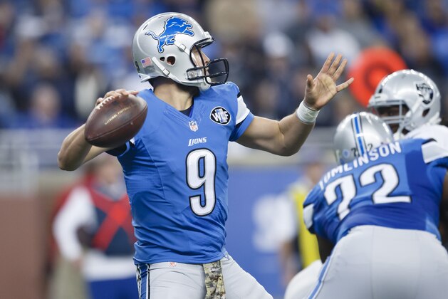 Detroit Lions quarterback Matthew Stafford (9) passes against the Oakland Raiders during an NFL football game at Ford Field in Detroit, Sunday, Nov. 22, 2015. (AP Photo/Rick Osentoski)