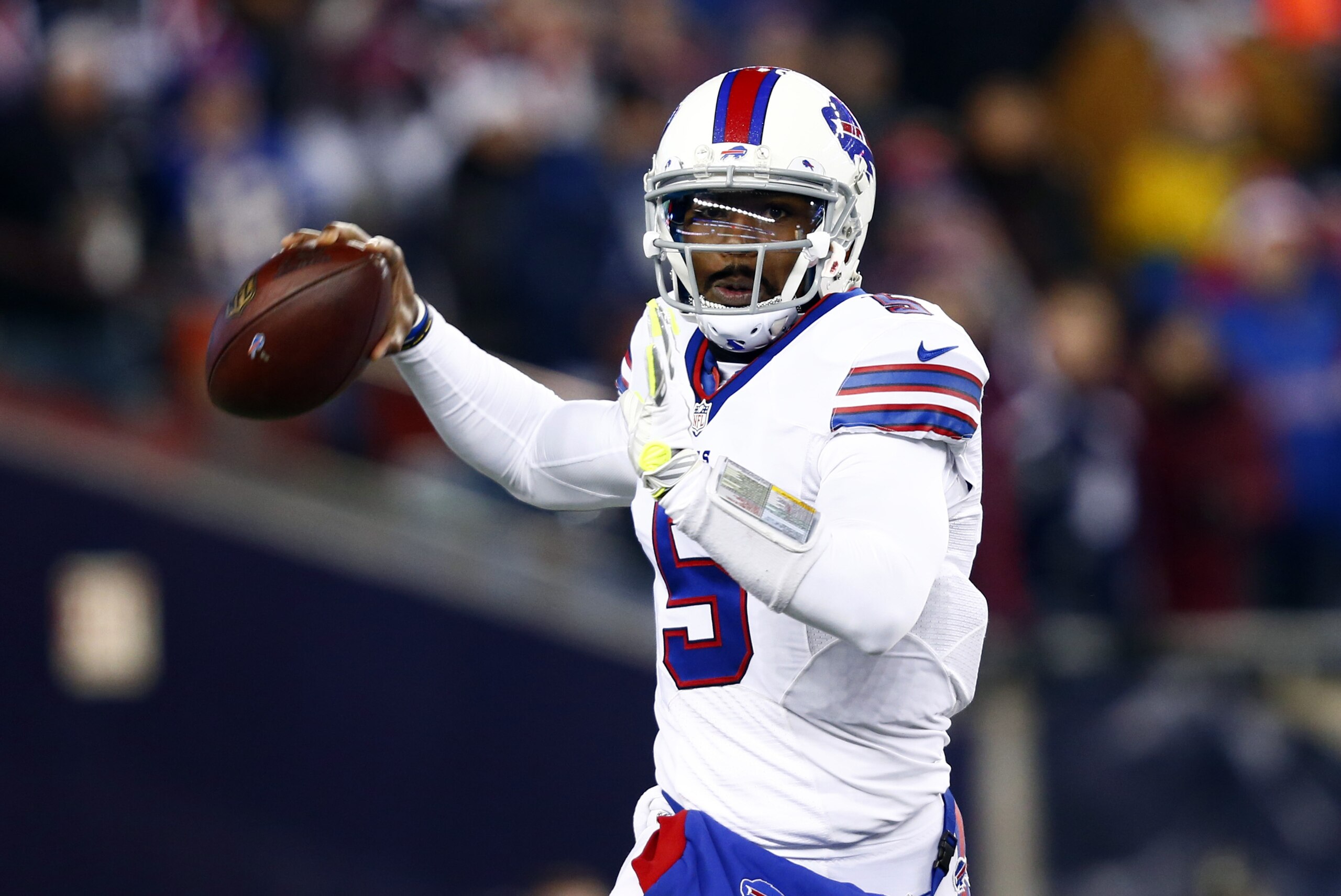 Nov 23, 2015; Foxborough, MA, USA; Buffalo Bills quarterback Tyrod Taylor (5) throws a pass against the New England Patriots during the first half at Gillette Stadium. Mandatory Credit: Mark L. Baer-USA TODAY Sports