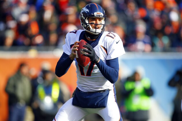 Denver Broncos quarterback Brock Osweiler (17) looks to pass against the Chicago Bears during an NFL football game, Sunday, Nov. 22, 2015, in Chicago. The Broncos won the game 17-15.  (Jeff Haynes/AP Images for Panini)