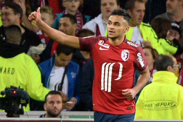 Lille's French midfielder Sofiane Boufal (C) celebrates after scoring a goal during the French L1 football match between Lille and Montpellier on October 2, 2015 at the Pierre Mauroy stadium in Villeneuve d'Ascq, northern France. AFP PHOTO / DENIS CHARLET        (Photo credit should read DENIS CHARLET/AFP/Getty Images)