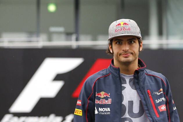 Toro Rosso driver Carlos Sainz Jr. of Spain arrives for a fan event ahead of the Japanese Formula One Grand Prix at the Suzuka Circuit in Suzuka, central Japan, Thursday, Sept. 24, 2015. (AP Photo/Shizuo Kambayashi)