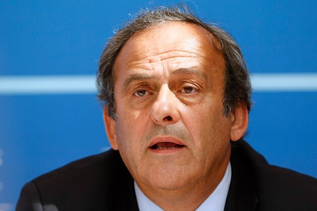 FILE - In this Aug. 28, 2015 file photo UEFA President Michel Platini delivers his speech during  a press conference after the soccer Europa League draw ceremony at the Grimaldi Forum, in Monaco. On Thursday, Oct. 8, 2015 file photo FIFA provisionally banned President Sepp Blatter and UEFA President Michel Platini for 90 days. (AP Photo/Claude Paris)