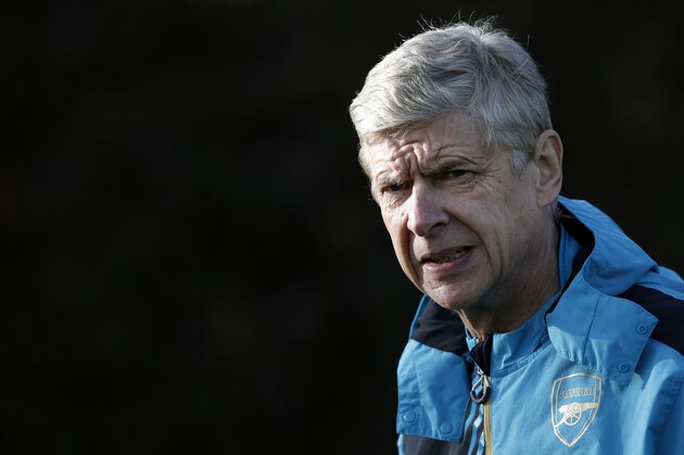 Arsenal's French manager Arsene Wenger attends a team training session at their London Colney training ground in Hertfordshire, north of London, on November 23, 2015. Arsenal play Dinamo Zagreb in a UEFA Champions League Group F match on November 24.   AFP PHOTO / ADRIAN DENNIS / AFP / ADRIAN DENNIS        (Photo credit should read ADRIAN DENNIS/AFP/Getty Images)
