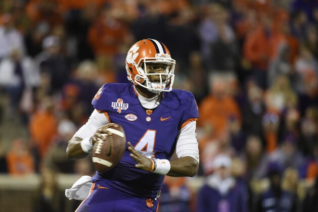 Clemson quarterback Deshaun Watson (4) looks to pass during the second half of an NCAA college football game against Wake Forest on Saturday, Nov. 21, 2015, in Clemson, S.C. (AP Photo/Rainier Ehrhardt)
