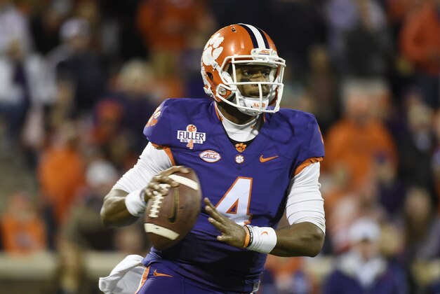 Clemson quarterback Deshaun Watson (4) looks to pass during the second half of an NCAA college football game against Wake Forest on Saturday, Nov. 21, 2015, in Clemson, S.C. (AP Photo/Rainier Ehrhardt)