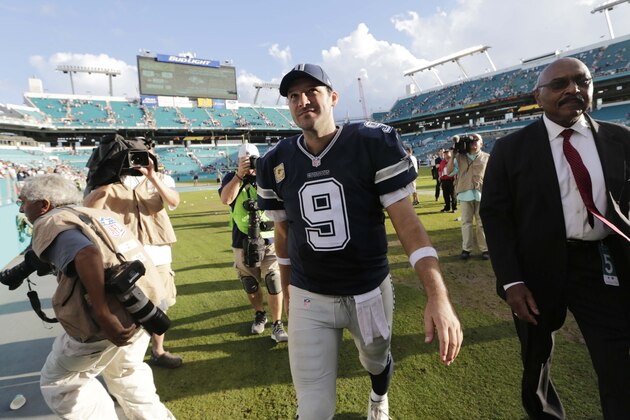 Dallas Cowboys quarterback Tony Romo (9) leaves the field at the end of an NFL football game against the Miami Dolphins, Sunday, Nov. 22, 2015, in Miami Gardens, Fla. The Cowboys defeated the Dolphins 24-14.  (AP Photo/Lynne Sladky)