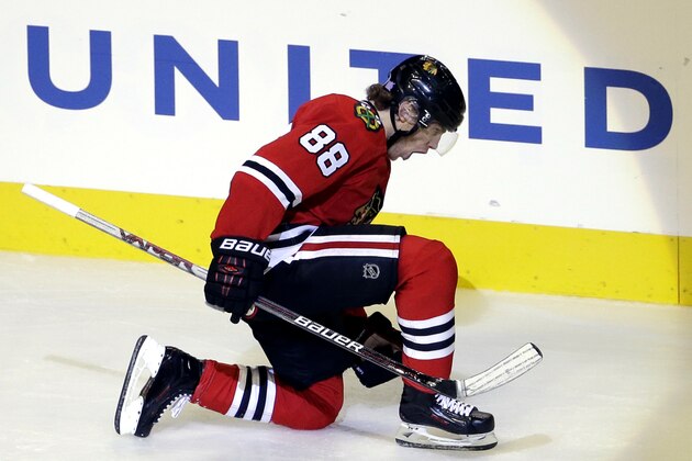 Chicago Blackhawks right wing Patrick Kane celebrates after scoring his goal during the third period of an NHL hockey game against the Edmonton Oiler,s Sunday, Nov. 8, 2015,  in Chicago. The Blackhawks won 4-2. (AP Photo/Nam Y. Huh)