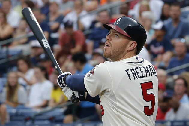 Atlanta Braves first baseman Freddie Freeman (5) bats against the New York Yankees in a baseball game Saturday, Aug. 29, 2015, in Atlanta. (AP Photo/John Bazemore)