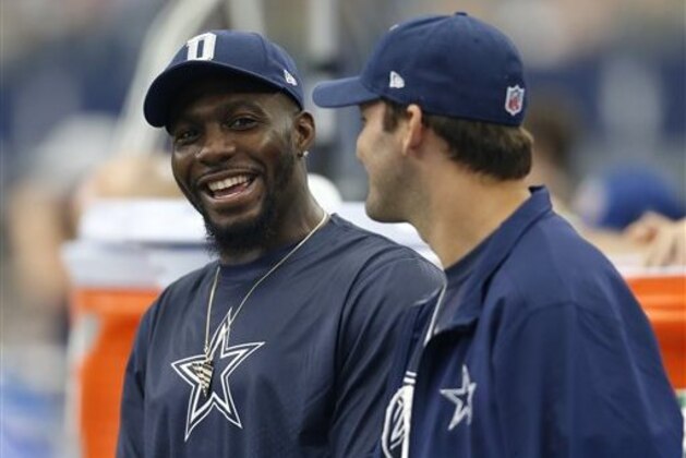 FILE - In this Sept. 27, 2015, file photo, Dallas Cowboys' Dez Bryant, left, and Tony Romo, right, talk on the sideline in the first half of an NFL football game against the Atlanta Falcons in Arlington, Texas. Bryant is returning to practice for the first time in almost seven weeks, boosting the prospects of Dallas\ All-Pro receiver returning from a broken foot against Seattle this week. (AP Photo/Brandon Wade, File)