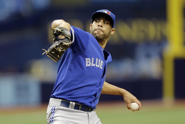 Toronto Blue Jays starting pitcher David Price delivers to Troy Tulowitzki during a simulated game before a baseball game between the Tampa Bay Rays and the Blue Jays Friday, Oct. 2, 2015, in St. Petersburg, Fla.  (AP Photo/Chris O'Meara)