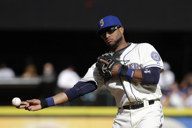 Seattle Mariners' Robinson Cano in aciton in a baseball game Sunday, Oct. 4, 2015, in Seattle. (AP Photo/Elaine Thompson)