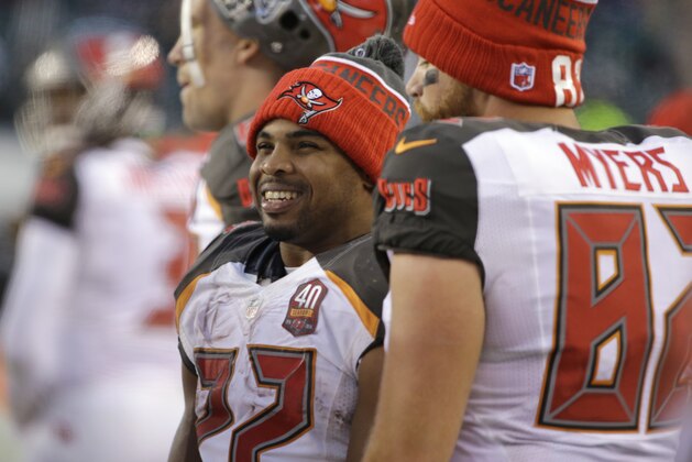 Tampa Bay Buccaneers' Doug Martin smiles on the sidelines during the second half of an NFL football game against the Philadelphia Eagles, Sunday, Nov. 22, 2015, in Philadelphia. (AP Photo/Matt Rourke)