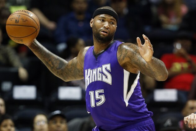 Sacramento Kings forward DeMarcus Cousins (15) grabs a rebound in the first half of an NBA  basketball game against the Atlanta Hawks  Wednesday, Nov. 18, 2015, in Atlanta. (AP Photo/John Bazemore)
