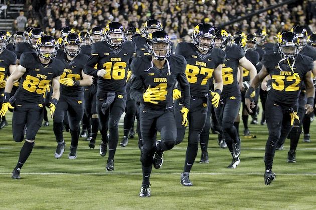IOWA CITY, IA - NOVEMBER 14: Wide receiver Tevaun Smith #4 of the Iowa Hawkeyes takes the field before the match-up against the Minnesota Gophers on November 14, 2015 at Kinnick Stadium, in Iowa City, Iowa. (Photo by Matthew Holst/Getty Images)