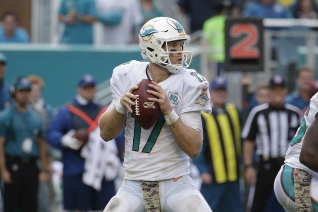 Miami Dolphins quarterback Ryan Tannehill (17) looks to pass during the first half of an NFL football game against the Dallas Cowboys, Sunday, Nov. 22, 2015, in Miami Gardens, Fla.  (AP Photo/Lynne Sladky)