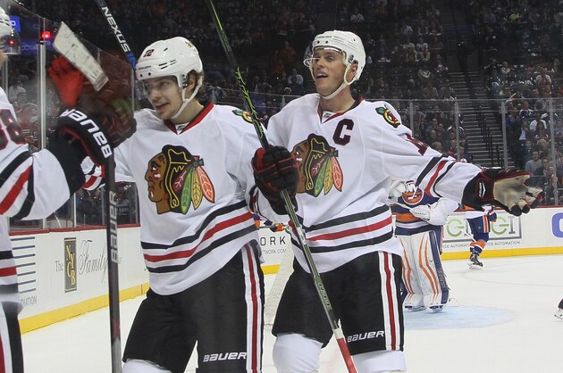 NEW YORK, NY - OCTOBER 09: Patrick Kane #88 of the Chicago Blackhawks (l) scores at 15:11 of the second period against the New York Islanders and is joined by Artemi Panarin #72 (c) and Jonathan Toews #19 (r) at the Barclays Center on October 9, 2015 in Brooklyn borough of New York City. The game is the first for the Islanders in their new arena. The Blackhawks defeated the Islanders 3-2 in overtime. (Photo by Bruce Bennett/Getty Images) NEW YORK, NY - OCTOBER 09: Patrick Kane #88 of the Chicago Blackhawks (l) scores at 15:11 of the second period against the New York Islanders and is joined by Artemi Panarin #72 (c) and Jonathan Toews #19 (r) at the Barclays Center on October 9, 2015 in Brooklyn borough of New York City. The game is the first for the Islanders in their new arena. The Blackhawks defeated the Islanders 3-2 in overtime. (Photo by Bruce Bennett/Getty Images)
