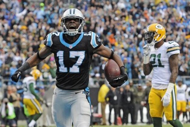 FILE - In this Nov. 8, 2015, file photo, Carolina Panthers' Devin Funchess (17) celebrates his touchdown as Green Bay Packers' Ha Ha Clinton-Dix (21) watches in the second half of an NFL football game in Charlotte, N.C. A last-second field goal keeps the New England Patriots unbeaten and No. 1 in the AP Pro32 rankings, and the Carolina Panthers are up to No. 2 with the league's only other perfect record. (AP Photo/Mike McCarn, File)