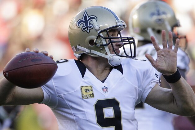 New Orleans Saints quarterback Drew Brees (9) passes the ball during the second half of an NFL football game against the Washington Redskins in Landover, Md., Sunday, Nov. 15, 2015. (AP Photo/Mark Tenally)