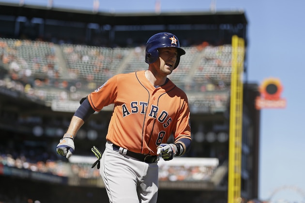 Houston Astros' Jed Lowrie after hitting a home run in the eighth inning of their baseball game against the San Francisco Giants Wednesday, Aug. 12, 2015, in San Francisco. (AP Photo/Eric Risberg)