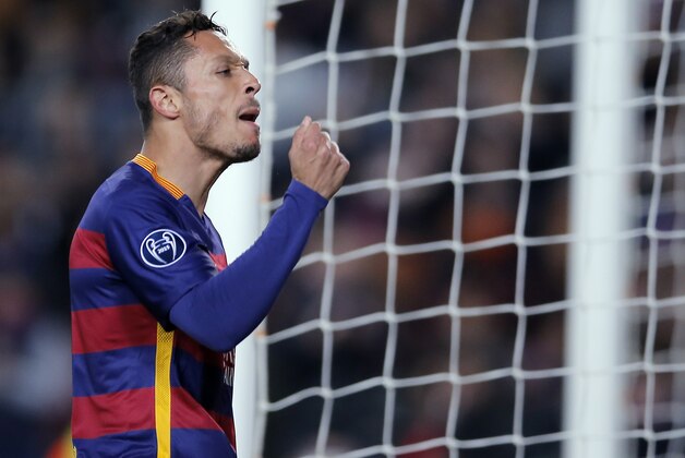 Barcelona's Adriano Correia celebrates after scoring his side's sixth goal during the Group E Champions League soccer match between Barcelona and Roma at the Camp Nou stadium in Barcelona, Spain, Tuesday Nov. 24, 2015. (AP Photo/Manu Fernandez)