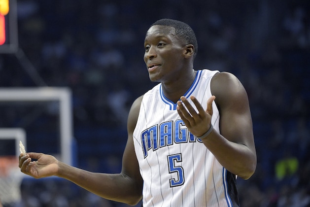 Orlando Magic guard Victor Oladipo (5) argues with an official after being called for a foul during the first half of an NBA basketball game against the Sacramento Kings in Orlando, Fla., Saturday, Nov. 21, 2015. (AP Photo/Phelan M. Ebenhack)