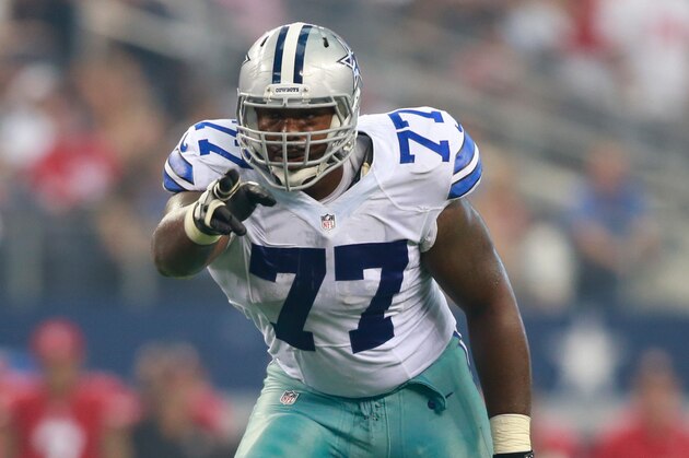 Sep 7, 2014; Arlington, TX, USA; Dallas Cowboys tackle Tyron Smith (77) in game action in the game against the San Francisco 49ers at AT&T Stadium. San Francisco beat Dallas 28-17. Mandatory Credit: Tim Heitman-USA TODAY Sports