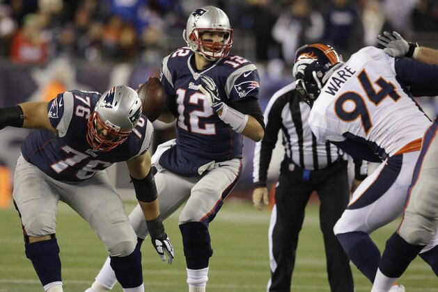 New England Patriots quarterback Tom Brady (12) drops back to pass in the first half of an NFL football game against the Denver Broncos on Sunday, Nov. 2, 2014, in Foxborough, Mass. (AP Photo/Stephan Savoia)