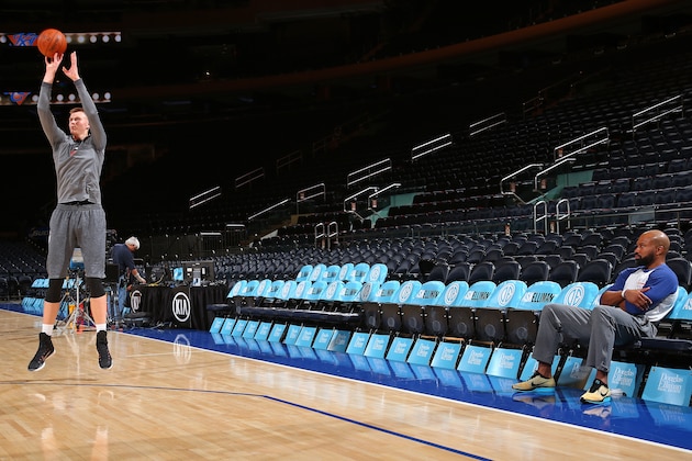NEW YORK, NY - OCTOBER 16: Derek Fisher watches Kristaps Porzingis #6 of the New York Knicks warm up before a preseason game against the Boston Celtics on October 16, 2015 at Madison Square Garden in New York City, New York. NOTE TO USER: User expressly acknowledges and agrees that, by downloading and or using this photograph, User is consenting to the terms and conditions of the Getty Images License Agreement. Mandatory Copyright Notice: Copyright 2015 NBAE (Photo by Reid Kelley/NBAE via Getty Images) NEW YORK, NY - OCTOBER 16: Derek Fisher watches Kristaps Porzingis #6 of the New York Knicks warm up before a preseason game against the Boston Celtics on October 16, 2015 at Madison Square Garden in New York City, New York. NOTE TO USER: User expressly acknowledges and agrees that, by downloading and or using this photograph, User is consenting to the terms and conditions of the Getty Images License Agreement. Mandatory Copyright Notice: Copyright 2015 NBAE (Photo by Reid Kelley/NBAE via Getty Images)