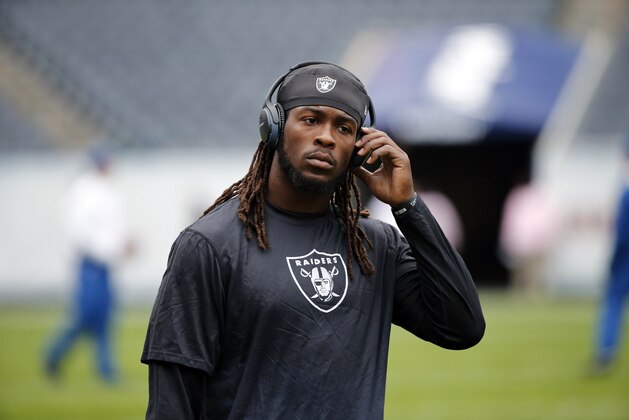 Oakland Raiders outside linebacker Ray-Ray Armstrong warms up before an NFL football game against the Chicago Bears, Sunday, Oct. 4, 2015, in Chicago. (AP Photo/Charles Rex Arbogast)