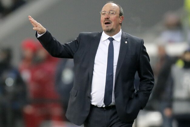Real Madrid's coach Rafael Benitez gives instructions to his players during the Champions League Group A soccer match between FC Shakhtar and Real Madrid at Arena Lviv stadium in Lviv, Western Ukraine, Wednesday, Nov. 25, 2015. (AP Photo/Efrem Lukatsky)