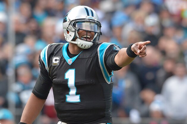 CHARLOTTE, NC - NOVEMBER 22:  Cam Newton #1 of the Carolina Panthers moves his offense into position during their game against the Washington Redskins at Bank of America Stadium on November 22, 2015 in Charlotte, North Carolina. The Panthers won 44-16.  (Photo by Grant Halverson/Getty Images)