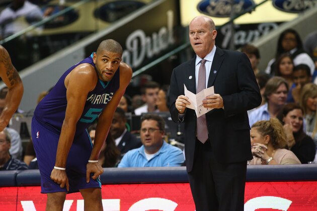 DALLAS, TX - NOVEMBER 05:  Head coach Steve Clifford and Nicolas Batum #5 of the Charlotte Hornets during play against the Dallas Mavericks at American Airlines Center on November 5, 2015 in Dallas, Texas.  NOTE TO USER:  User expressly acknowledges and agrees that, by downloading and or using photograph, User is consenting to the terms and conditions of the Getty Images License Agreement.  (Photo by Ronald Martinez/Getty Images)