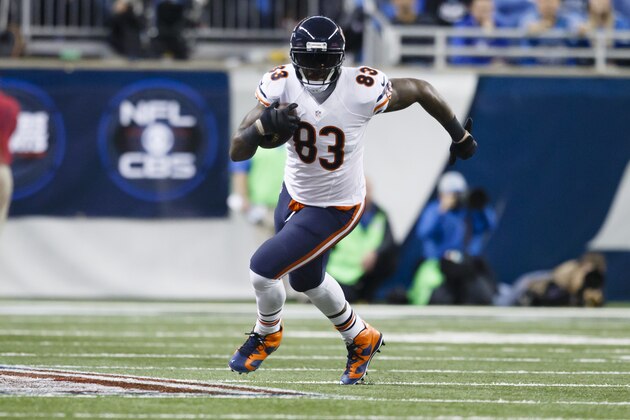 Chicago Bears tight end Martellus Bennett (83) runs the ball against the Detroit Lions during an NFL football game at Ford Field in Detroit, Thursday, Nov. 27, 2014. (AP Photo/Rick Osentoski)