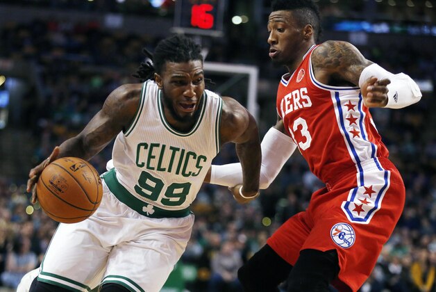 Boston Celtics' Jae Crowder (99) drives past Philadelphia 76ers' Robert Covington (33) during the first quarter of an NBA basketball game in Boston, Wednesday, Nov. 25, 2015. (AP Photo/Michael Dwyer)