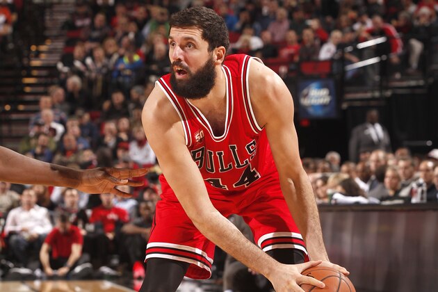 PORTLAND, OR - NOVEMBER 24: Nikola Mirotic #44 of the Chicago Bulls handles the ball during the game against the Portland Trail Blazers on November 24, 2015 at the Moda Center Arena in Portland, Oregon. NOTE TO USER: User expressly acknowledges and agrees that, by downloading and or using this photograph, user is consenting to the terms and conditions of the Getty Images License Agreement. Mandatory Copyright Notice: Copyright 2015 NBAE (Photo by Cameron Browne/NBAE via Getty Images)