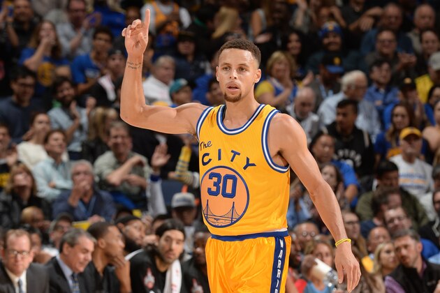OAKLAND, CA - NOVEMBER 17:  Stephen Curry #30 of the Golden State Warriors celebrates during the game against the Toronto Raptors on November 17, 2015 at Oracle Arena in Oakland, California. NOTE TO USER: User expressly acknowledges and agrees that, by downloading and or using this photograph, user is consenting to the terms and conditions of Getty Images License Agreement. Mandatory Copyright Notice: Copyright 2015 NBAE (Photo by Noah Graham/NBAE via Getty Images)