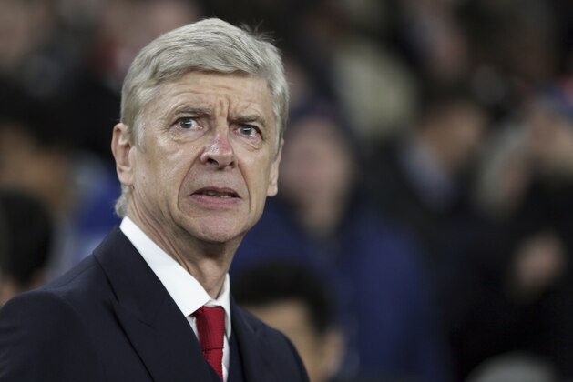Arsenal's manager Arsene Wenger looks on at the beginning of the Champions League Group F soccer match between Arsenal and Dinamo Zagreb, at The Emirates Stadium in London, Britain, Tuesday, Nov. 24, 2015. (AP Photo/Tim Ireland)