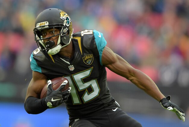 Oct 25, 2015; London, United Kingdom; Jacksonville Jaguars receiver Allen Robinson (15) carries the ball against the Buffalo Bills during NFL International Series game at Wembley Stadium. Mandatory Credit: Kirby Lee-USA TODAY Sports