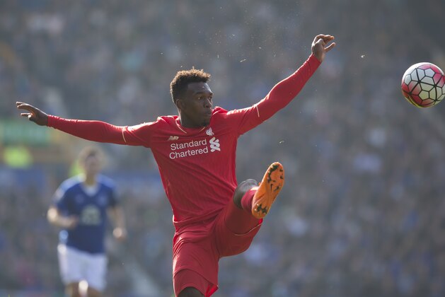 Liverpool's Daniel Sturridge stretches for a ball during the English Premier League soccer match between Everton and Liverpool at Goodison Park Stadium, Liverpool, England, Sunday Oct. 4, 2015. (AP Photo/Jon Super)