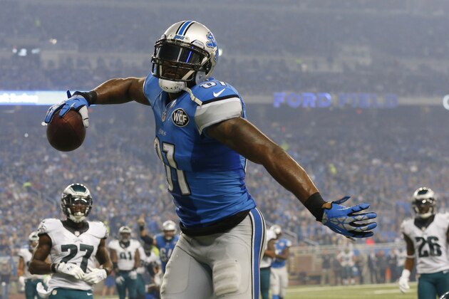 Detroit Lions wide receiver Calvin Johnson spikes the ball after scoring a touchdown during the second half of an NFL football game against the Philadelphia Eagles, Thursday, Nov. 26, 2015, in Detroit. (AP Photo/Paul Sancya)