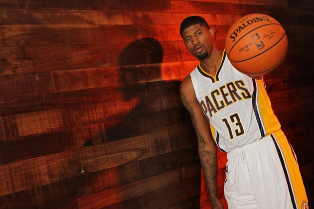 INDIANAPOLIS - SEPTEMBER 28:  Paul George #13 of the Indiana Pacers poses for a portrait during the Indiana Pacers media day at Bankers Life Fieldhouse on September 28, 2015 in Indianapolis, Indiana.  NOTE TO USER: User expressly acknowledges and agrees that, by downloading and or using this Photograph, user is consenting to the terms and condition of the Getty Images License Agreement. Mandatory Copyright Notice: 2014 NBAE  (Photo by Ron Hoskins/NBAE via Getty Images)
