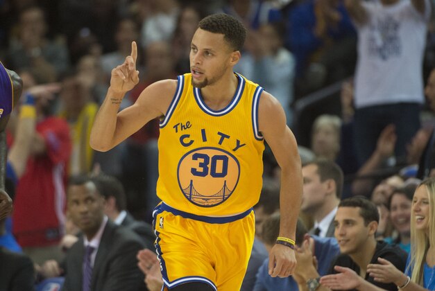 November 24, 2015; Oakland, CA, USA; Golden State Warriors guard Stephen Curry (30) celebrates against the Los Angeles Lakers during the first quarter at Oracle Arena. Mandatory Credit: Kyle Terada-USA TODAY Sports