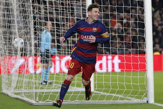 Barcelona's Lionel Messi scores his team's 5th goal during the Group E Champions League soccer match between Barcelona and Roma at the Camp Nou stadium in Barcelona, Spain, Tuesday Nov. 24, 2015. (AP Photo/Emilio Morenatti)