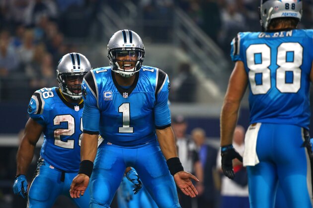 ARLINGTON, TX - NOVEMBER 26: Cam Newton #1 of the Carolina Panthers shouts instructions as teammates Greg Olsen #88 and Jonathan Stewart #28 look on as the Panthers take on the Dallas Cowboys in the second half at AT&T Stadium on November 26, 2015 in Arlington, Texas. (Photo by Tom Pennington/Getty Images)
