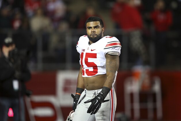 Ohio State running back Ezekiel Elliott (15) walks off the field during an NCAA college football game against Rutgers Saturday, Oct. 24, 2015, in Piscataway, N.J. (AP Photo/Mel Evans)