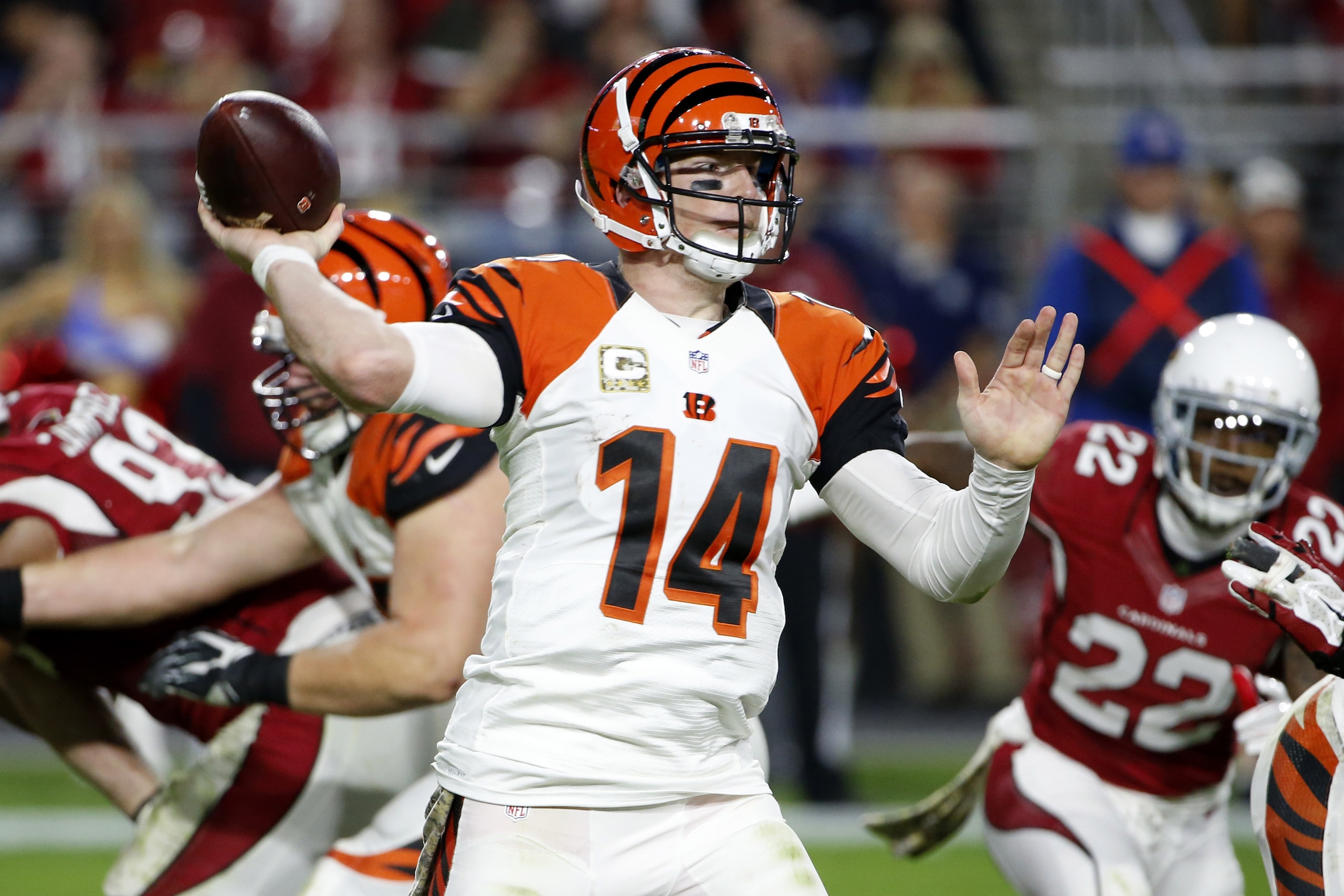 Cincinnati Bengals quarterback Andy Dalton (14) makes a throw against the Arizona Cardinals during the second half of an NFL football game, Sunday, Nov. 22, 2015, in Glendale, Ariz. (AP Photo/Ross D. Franklin)