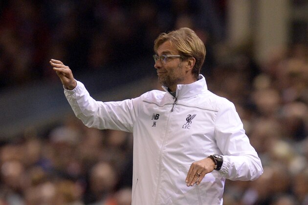 Liverpool's German manager Jurgen Klopp gestures during a UEFA Europa League group B football match between Liverpool and Bordeaux at Anfield in Liverpool, north west England, on November 26, 2015. AFP PHOTO / OLI SCARFF / AFP / OLI SCARFF        (Photo credit should read OLI SCARFF/AFP/Getty Images)