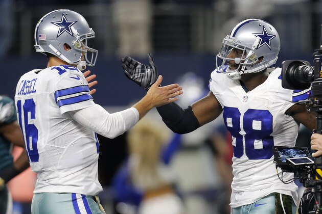 Dallas Cowboys' Matt Cassel (16) congratulates Dez Bryant (88) on his touchdown catch in the second half of an NFL football game against the Philadelphia Eagles on Sunday, Nov. 8, 2015, in Arlington, Texas. (AP Photo/Brandon Wade)