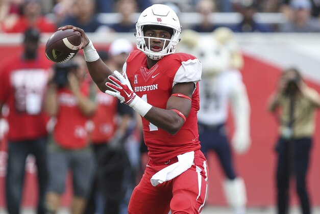 Nov 27, 2015; Houston, TX, USA; Houston Cougars quarterback Greg Ward Jr. (1) looks for an open receiver during the first quarter against the Navy Midshipmen at TDECU Stadium. Mandatory Credit: Troy Taormina-USA TODAY Sports